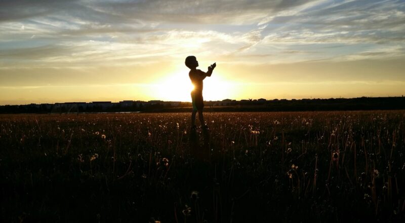 memories-young-boy-sunset-silhouette